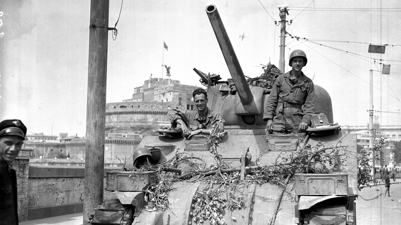 Tank crew going through Rome
