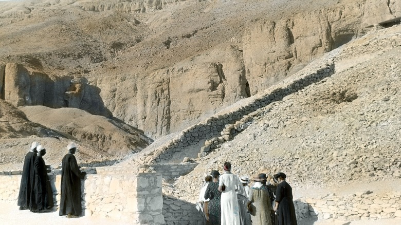 Pedestrians walking near Tutankhamun's tomb