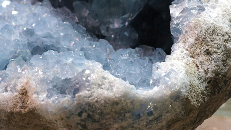 Closeup of some pale blueish crystals inside a geode.