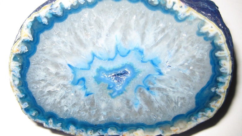 Slice of a geode artificially dyed deep blue