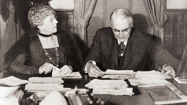 Florence and Warren Harding read election reports, 1920
