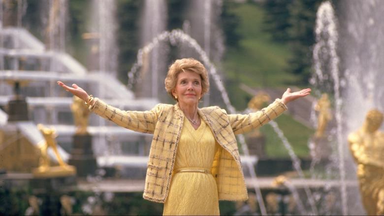 Nancy Reagan in front of a fountain