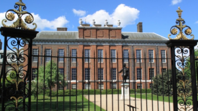 Kensington Palace stands behind its gates