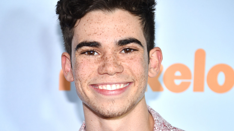 Cameron Boyce smiling freckles at event
