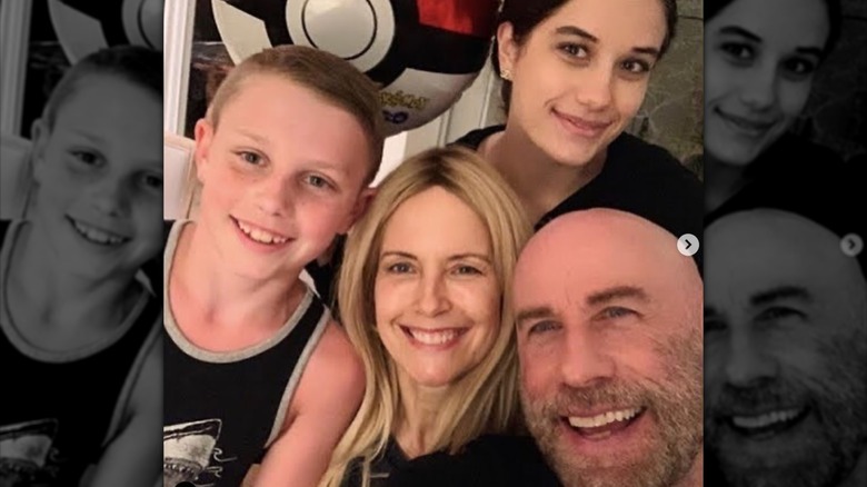 Kelly Preston John Travolta smiling with family