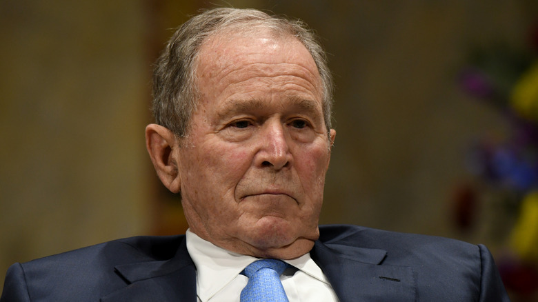 George Bush slouching