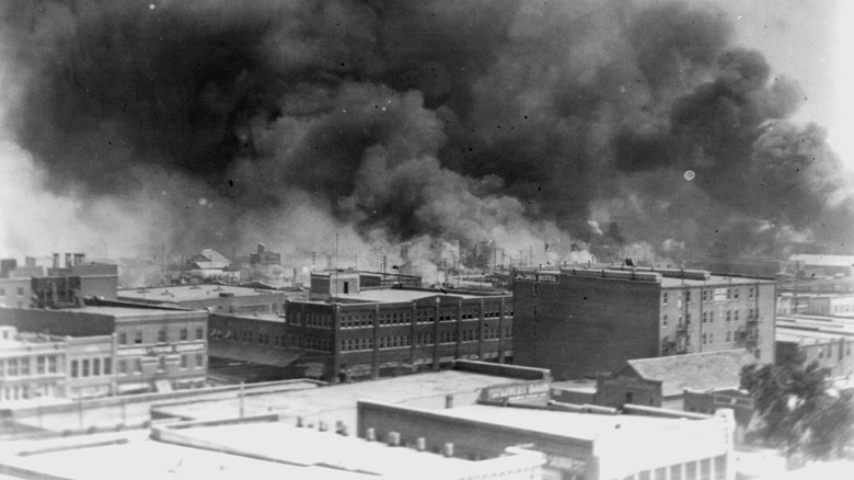 Photo of Black Wall Street in flames, 1921