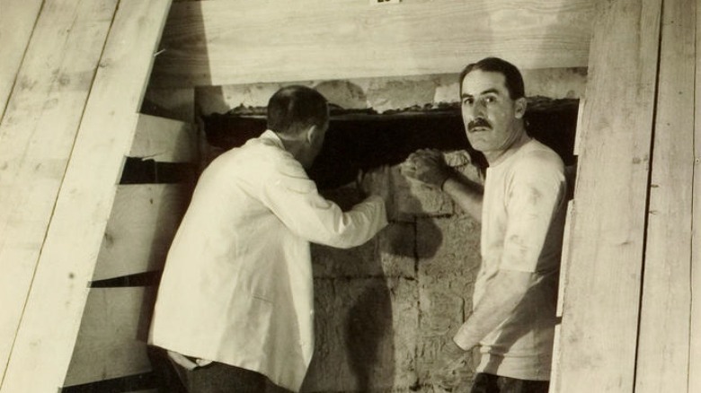 Howard Carter recreating opening of Tutankhamun's tomb