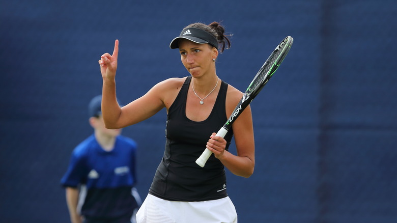 Aleksandrina Naydenova holds up a finger on court