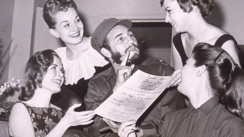 Fidel Castro surrounded by women in 1959