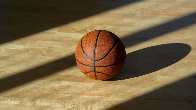 Basketball on empty court