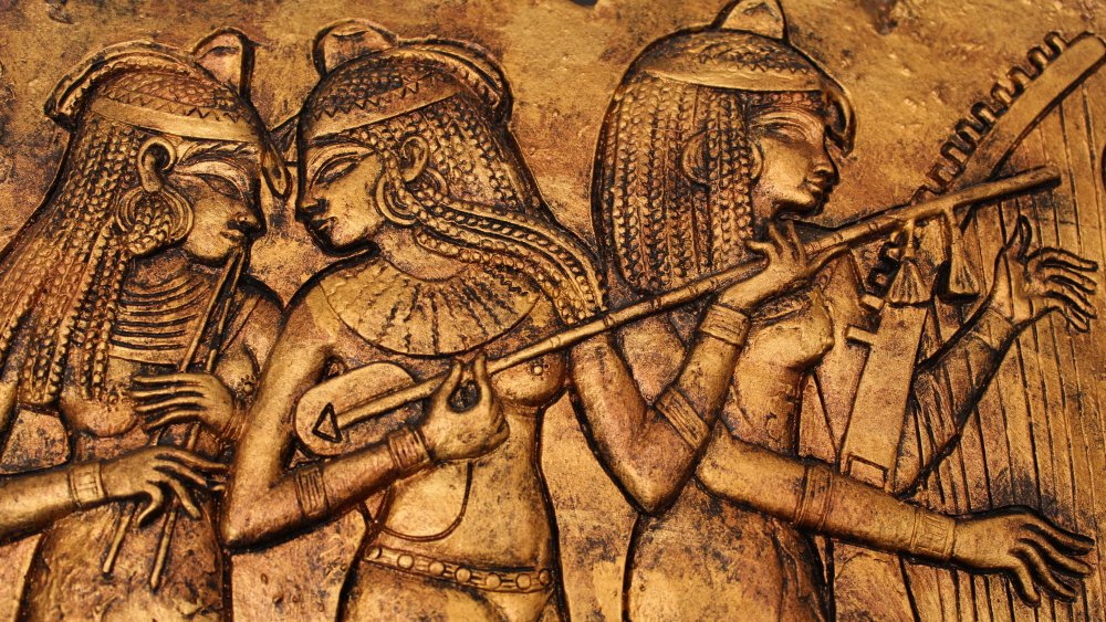 Artwork depicting women socializing in ancient Egypt