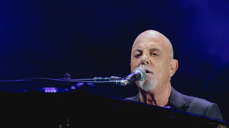 Billy Joel performing microphone