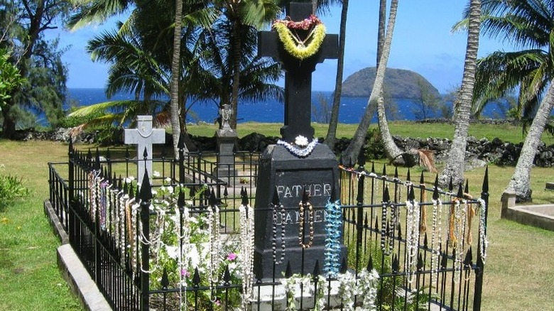 Original grave of Saint Damien beads railing