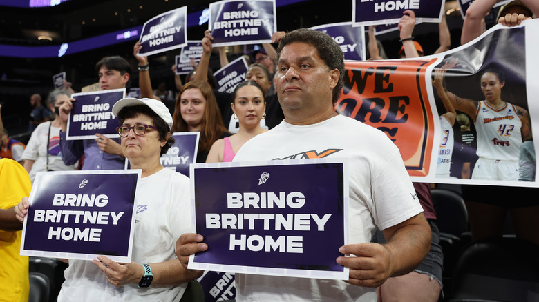 Brittney Griner supporters holding signs
