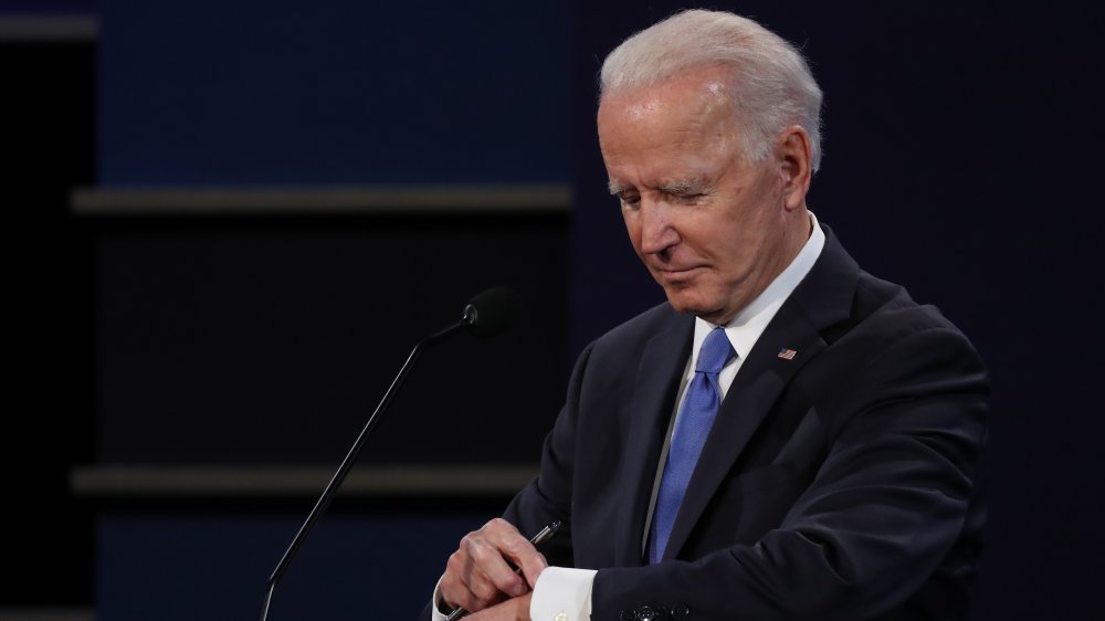 Joe Biden checking his watch
