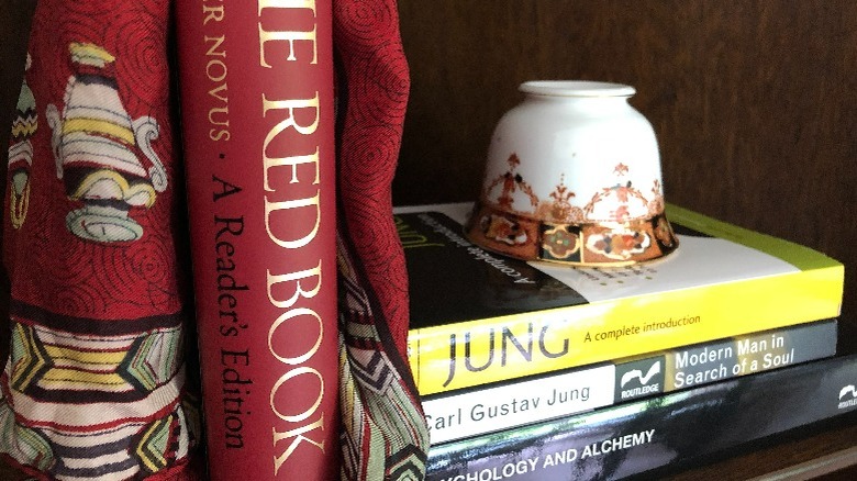Shelf with The Red Book and others by Carl Jung