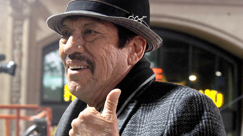 Danny Trejo smiling thumbs up