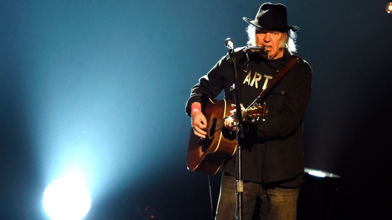 Neil Young performing on stage