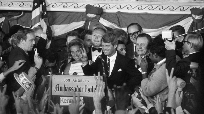 Robert F. Kennedy campaing podium waving