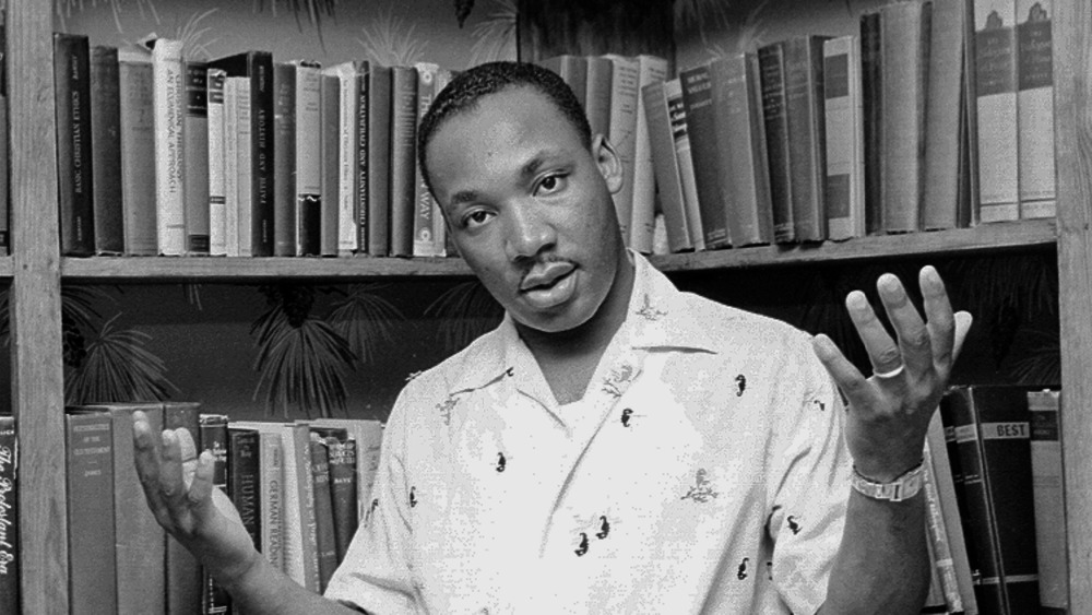 1956: Civil rights leader Reverend Martin Luther King, Jr. relaxes at home in May 1956 in Montgomery, Alabama. 