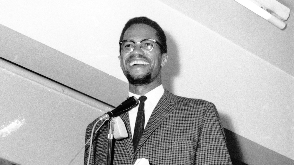 Malcolm X (1925 - 1965) addresses a meeting, UK, 22nd November 1964.