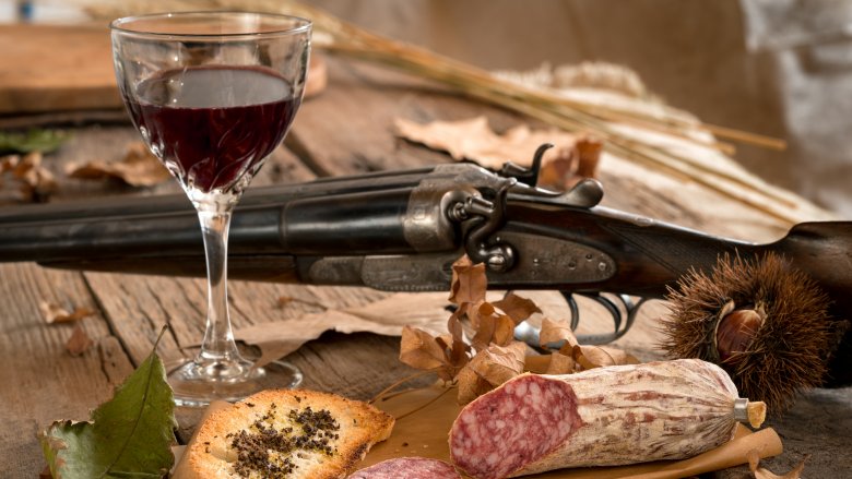 Wine and a rifle