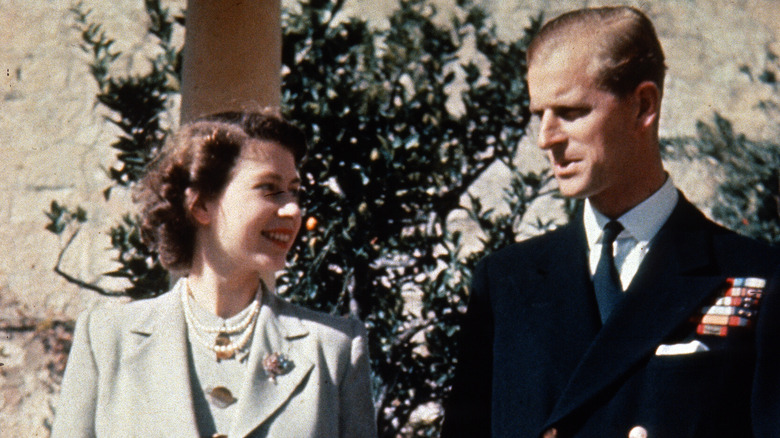 Young Elizabeth II and Prince Philip talking