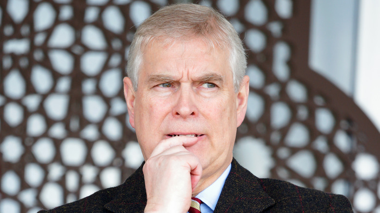 Prince Andrew finger in mouth
