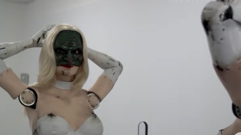 female robot with mask on