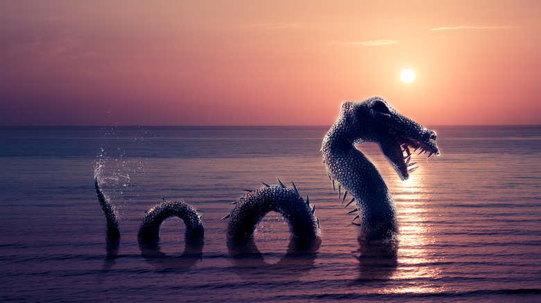serpentine lake monster against sunset