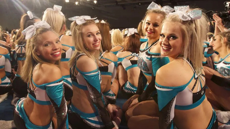 Cheerleaders attend a competition