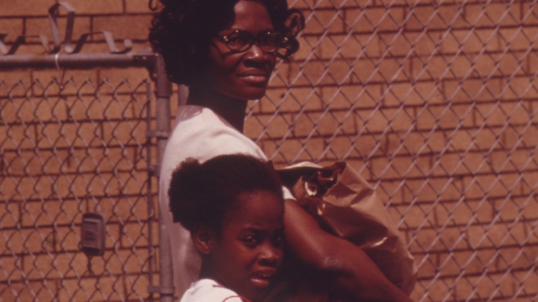 mother and daughter in aftermath of Chicago riots