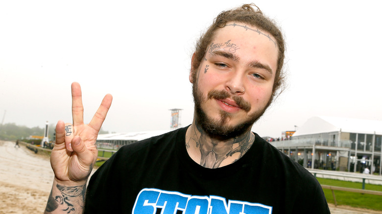 Post Malone, who has several face and finger tattoos