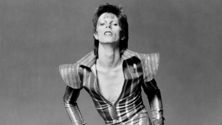 David Bowie posing as Ziggy Stardust