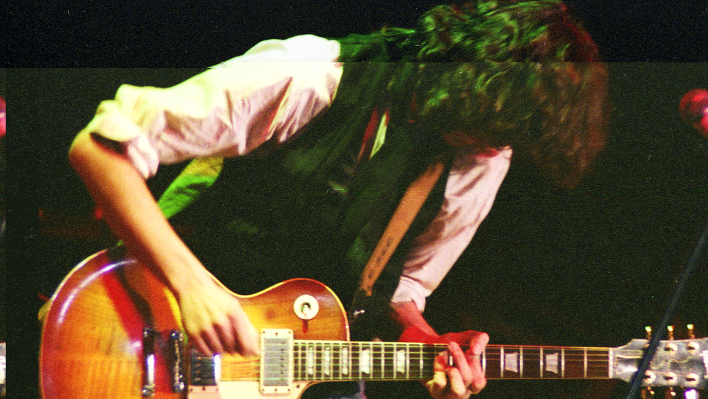 Led Zeppelin guitarist Jimmy Page performs in 1983