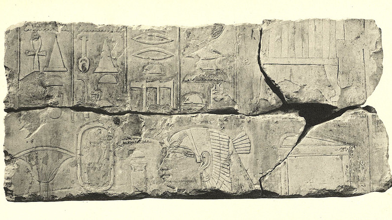 Egyptian stone reliefs face hieroglyphics 