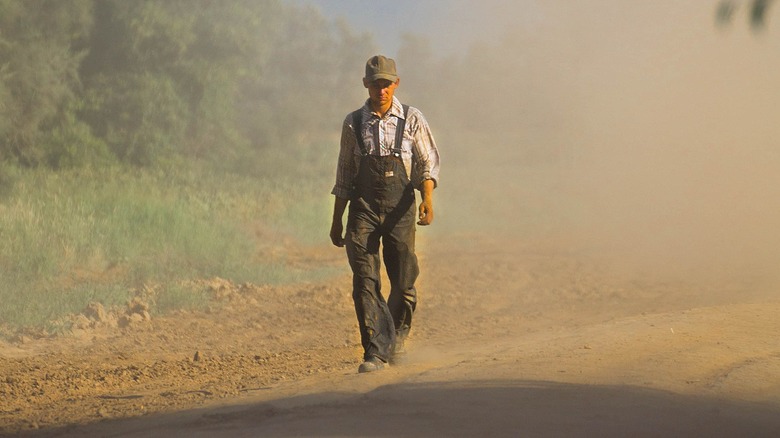 Mennonite man in bolivia dusty road cap