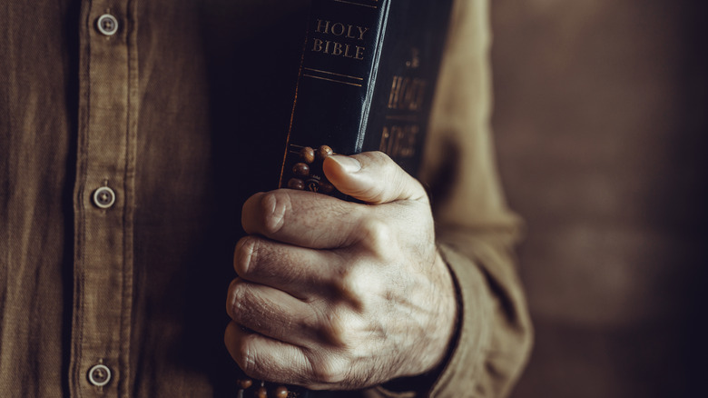 hand holding bible closeup