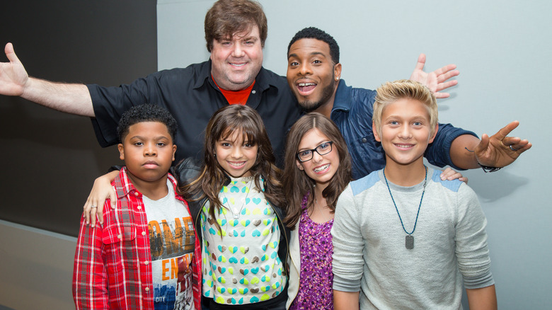 Dan Schneider with a group of Nickelodeon kids