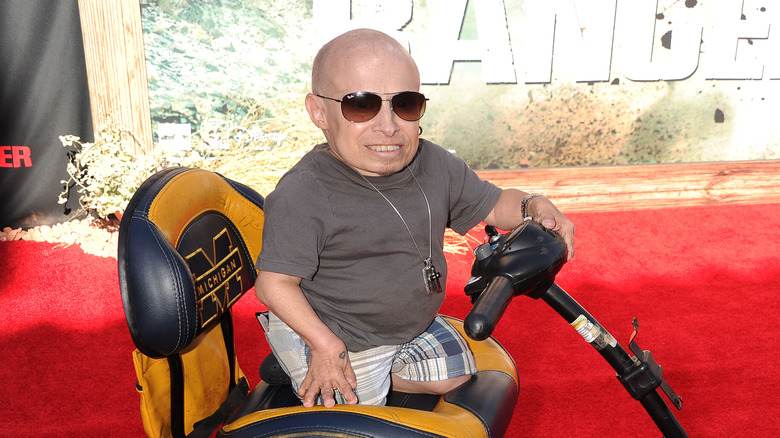 Verne Troyer sunglasses scooter red carpet