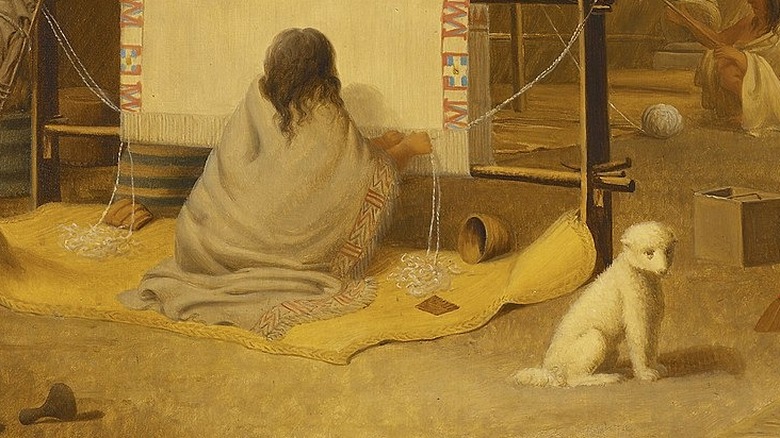 A weaver and a Salish wool dog