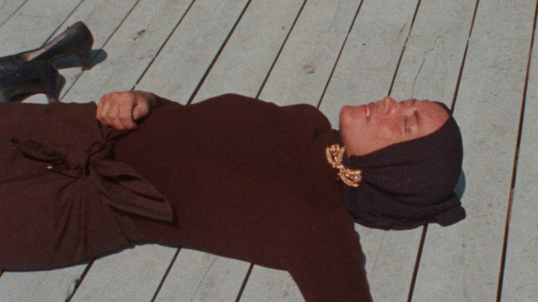 Edith Bouvier Beale laying on the ground, sunbathing