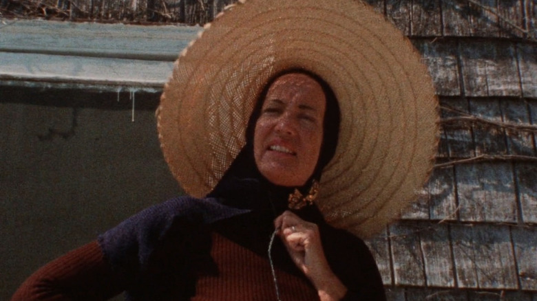 Edith Bouvier Beale looking off, wearing big hat