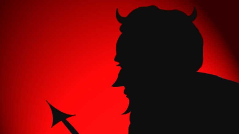 Devil silhouette red light