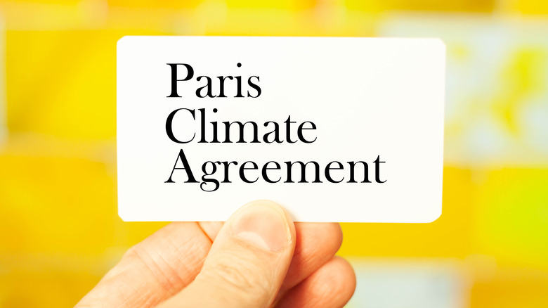 Card reading Paris climate agreement