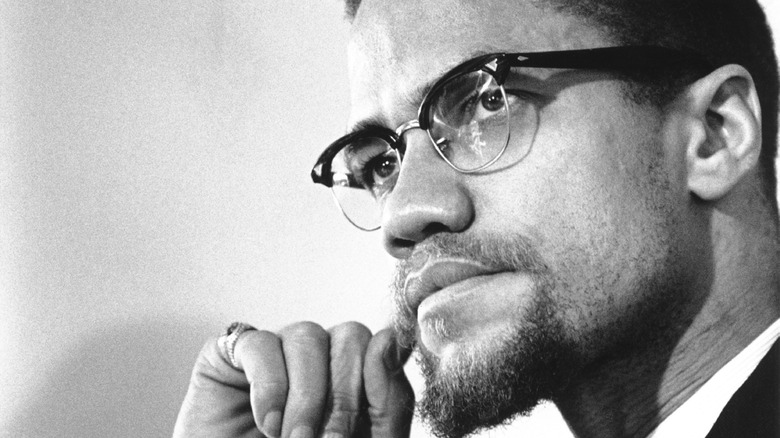 Malcolm X in glasses