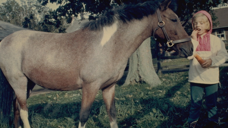 Caroline Kennedy with Macaroni the pony