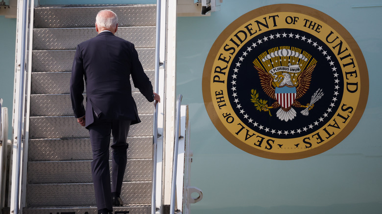 President Biden walking up stairs