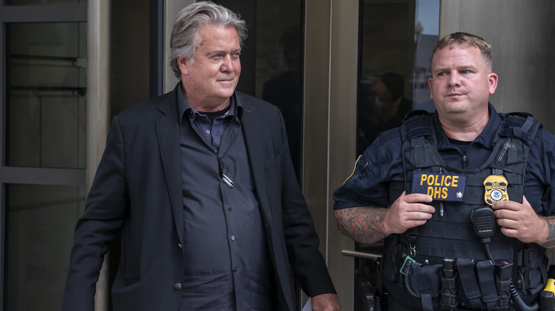 Steve Bannon escorted by police